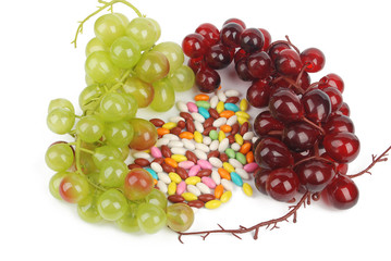 Fototapeta na wymiar Candies with grapes