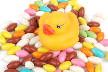 Fototapeta na wymiar Rubber duck with candies