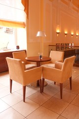 Modern table and chairs in hotel