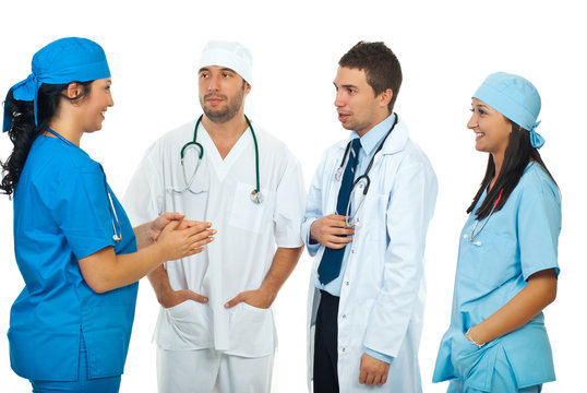 Doctor having conversation with her team