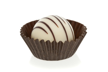 Gourmet chocolate truffles isolated on white background