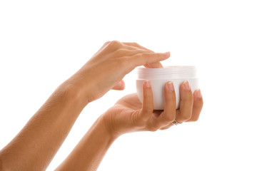 Female hands with cream