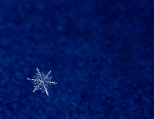 Fototapeta na wymiar Macro of natural snow flake with copy space