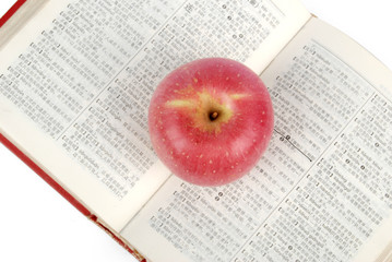 Red apple and book