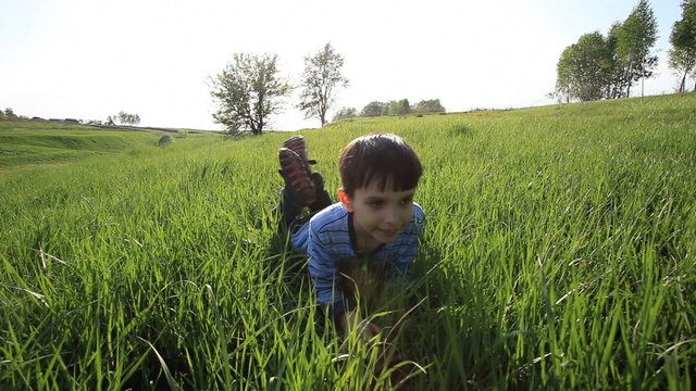 Boy, green grass
