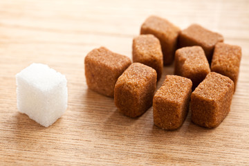 brown and white cubes of sugar