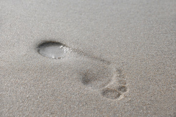 Fußabdruck am Strand