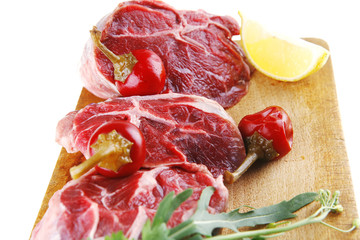 raw meat chunk on wood