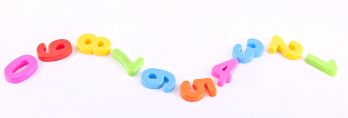 colorful plastic number on white background