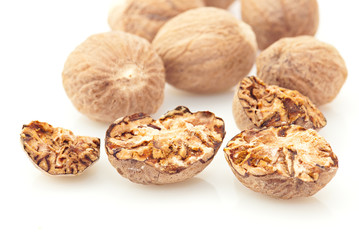 Nutmeg spice over white background