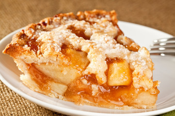 Slice of fresh baked rustic apple pie