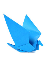 Origami bird over white