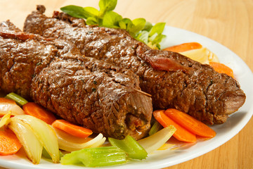 Roasted stuffed pork chop with vegetables