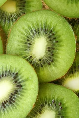 Photo sur Plexiglas Anti-reflet Tranches de fruits Tranches de kiwis