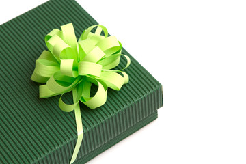 green gift with the green ribbon isolated on white background