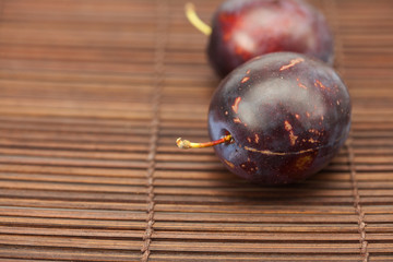 Plum on a bamboo mat