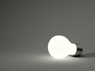 Light bulb isolated on grey background