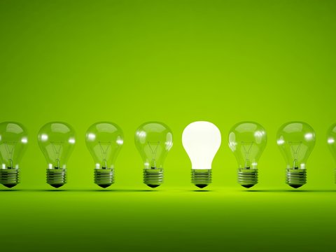 Turn on bulb on green background