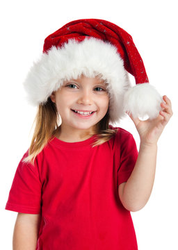 little girl in a santa claus hat