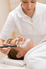 Obraz na płótnie Canvas Male cosmetics - facial mask in salon