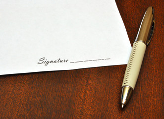 pen and blank paper for signature