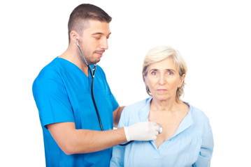 Doctor man assess senior woman