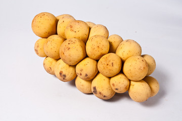 Lansiums on white background