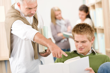 Obraz premium Library - university student with professor