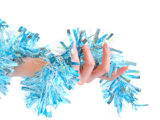 Tinsel on a female hand