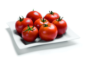 ripe tomatoes on plate