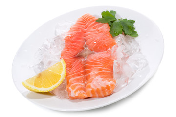 fresh salmon steak with ice and lemon