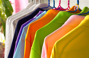 colorful t-shirt on the hangers