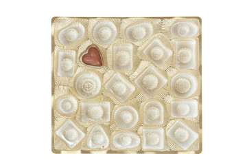 Chocolate candie in a gold box isolated