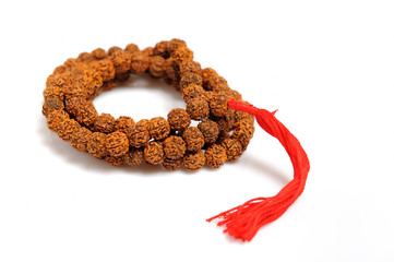 Traditional indian rosary for meditation - mala . isolated on wh