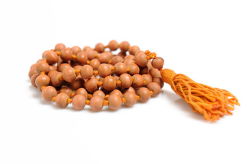 Traditional indian rosary for meditation - mala . isolated on wh