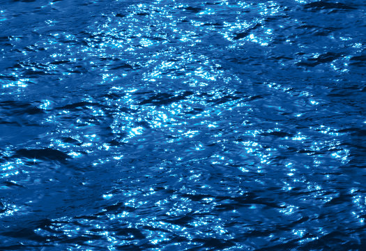 Fototapeta Sea waves under sunlight