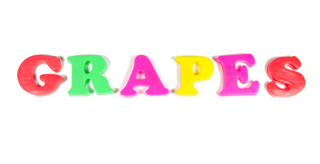 grapes written in fridge magnets
