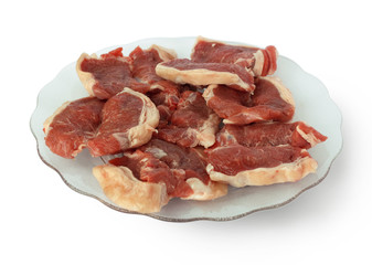 Raw filet steak on the white background