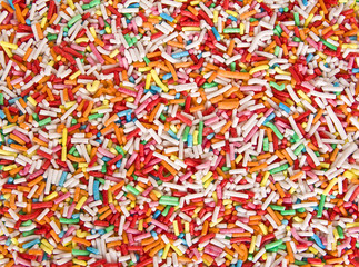 Fototapeta na wymiar colored little candies background