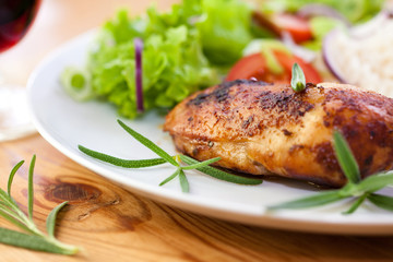 Roast chicken with rice and salad