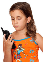 Beautiful girl looking at a phone with a worried look