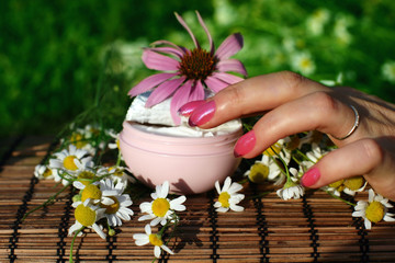 Hand with a cosmetic natural cream © Tatiana Belova