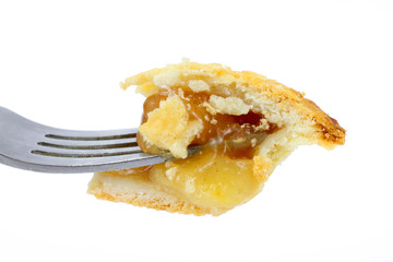 Bite of apple pie on fork