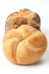 Three different buns on white background. Shallow dof