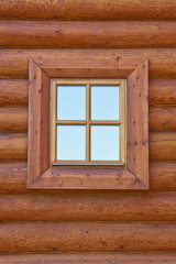 Obraz na płótnie Canvas Okno w starym drewnianym domu