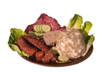 Dish of cold meats and lettuce