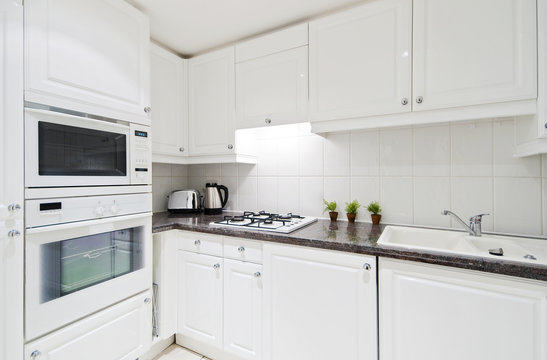 fully fitted white kitchen