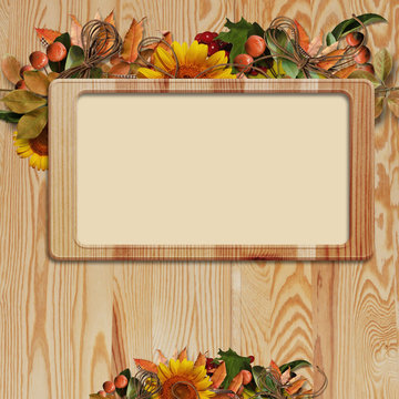 autumn  frame  on wooden background