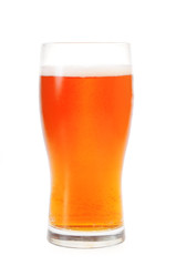 A pint of amber ale isolated on white background