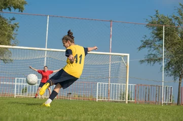 Foto op Canvas Girls playing soccer © Dusan Kostic